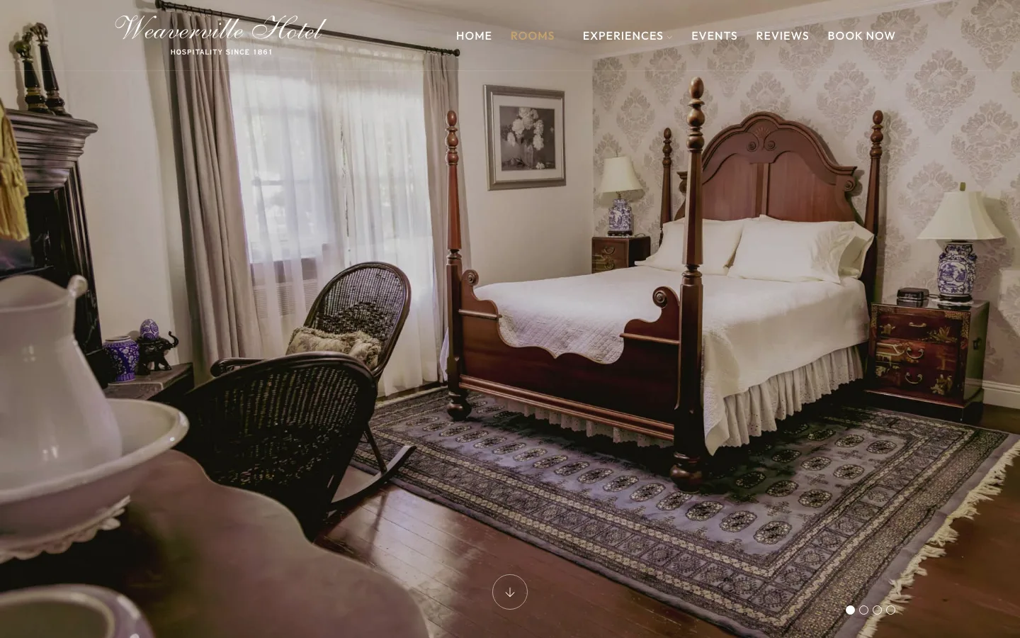 The La Grange Suite page: a four-poster bed, a rocking chair and a patterned rug, under the hotel's menu.